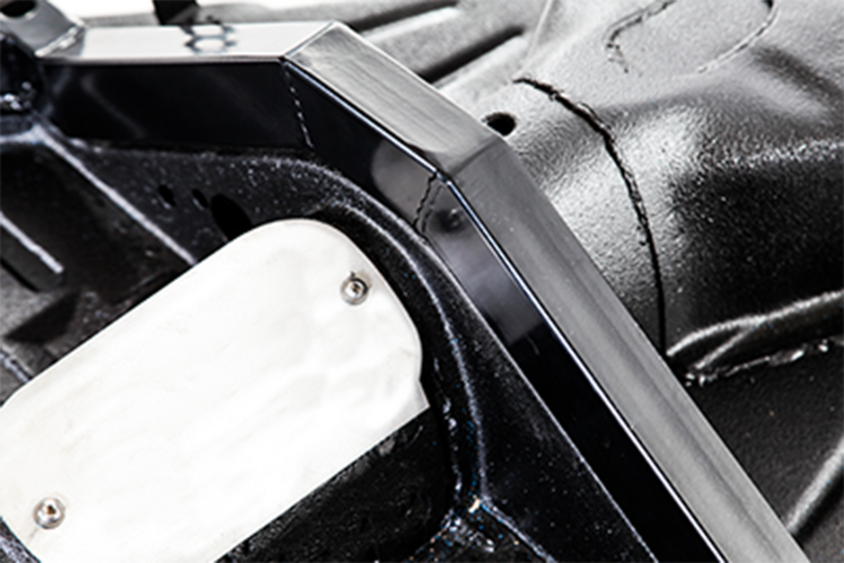 Close-up of a VW chassis with a black and white color scheme